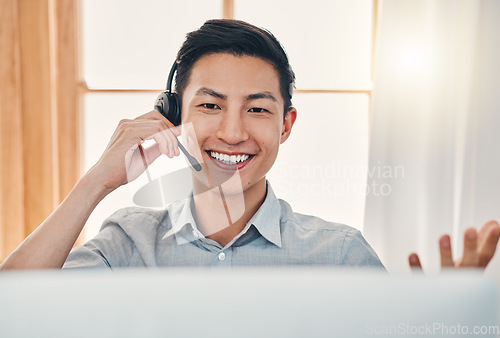 Image of Call center, customer service and worker with computer talking, helping and answer office with crm system. Happy man, happy and friendly telemarketing operator, secretary or contact us client support