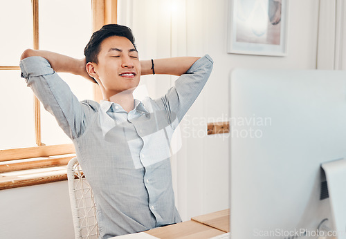 Image of Relax, calm and peace at work of a business man from China taking a break in a office. Businessman and asian IT tech employee feeling proud and happy after a corporate job project at a company