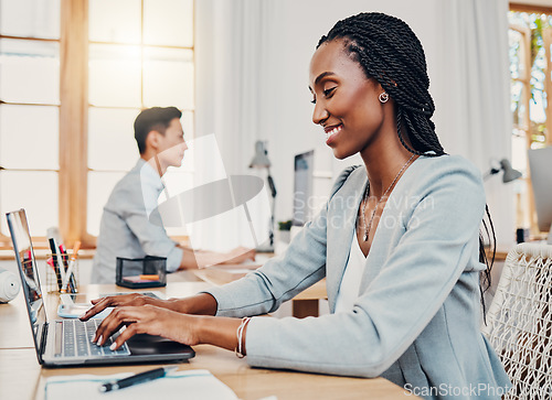 Image of Finance black woman, office and laptop typing corporate business financial accounting online profit report. African girl accountant, pc keyboard or writing company tax success strategy internet email