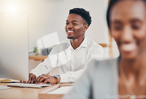 Image of Happy employee, working on computer at desk online and writing business email on keyboard. Team communication, staff productivity at office and workplace are important for marketing business success