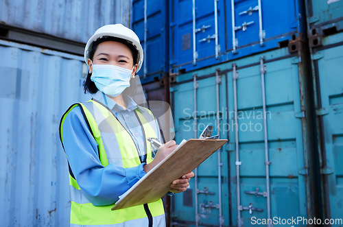 Image of Container, covid 19 and engineer woman checklist planning cargo distribution, shipping and manufacturing logistics. Supply chain Asian manager or contractor face mask for safety and virus protection