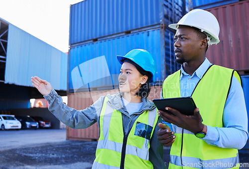 Image of Logistics, tablet and team for industry shipping of workers checking warehouse in container yard. Business people or contractors in teamwork working with technology and containers for shipment