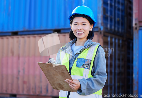 Image of Logistics, cargo and a woman with inventory checklist on clipboard. Container yard, supply chain and happy shipping port employee from Japan. Smile, manager or inspector global freight company depot.