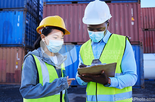 Image of Covid, documents and supply chain logistics with a team working in shipping on a commercial container dock. Teamwork, freight and cargo with a man and woman courier filling out an order or shipment