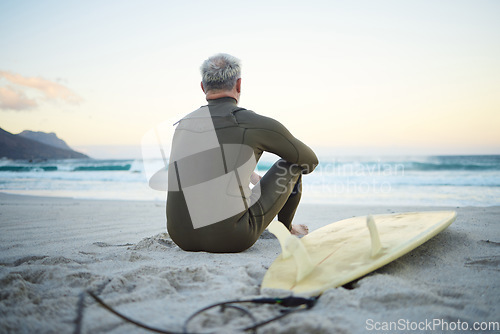 Image of Beach, waves and surfer on surfing holiday in Hawaii to relax in peace on the sand by the ocean in nature. Back of man thinking of travel vacation with board for adventure in the calm summer water
