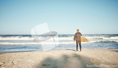 Image of Surf, nature and sea waves with a senior man surfer ready for exercise and water workout outdoor. Surfing fitness, beach training and sports cardio of an athlete on a sport adventure with mockup