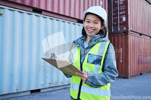 Image of Logistics, inspection and worker working at shipping warehouse and doing inventory check while at work at port. Portrait of an Asian construction employee with smile and notes on manufacturing stock