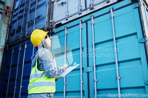 Image of Checklist, cargo and container management by woman, working with delivery and logistics. Shipping, stock and supply chain inspection by lady writing on clipboard, industry control and freight storage