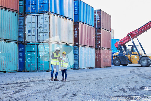 Image of Delivery, logistics and leader coaching at a container supply chain warehouse outdoors for stock inspection. Forklift, woman and black man planning cargo, product and manufacturing shipping in Dallas
