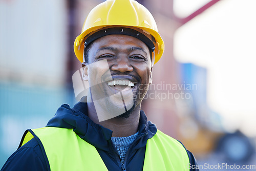 Image of Portrait, logistics and black man smile with helmet or hard hat at shipyard and confident at work. Shipping, business man and manager happy at warehouse, cargo storage or containers for supply chain.