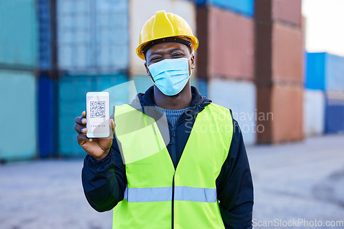 Image of Man, worker and covid health qr code passport on phone of immunity at work site in portrait. Black, shipping employee vaccine digital certificate in a mask and disease prevention in pandemic.