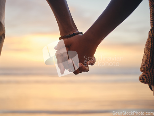 Image of Trust, love and holding hands with couple by the beach together for support, happy and relax on Miami summer vacation. Sunset, vision and nature with black man and woman on peace holiday