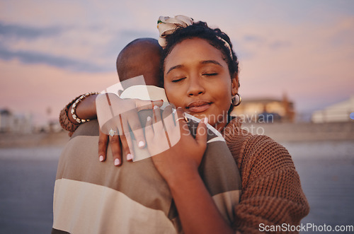 Image of Love, peace and calm black couple hug while relax on outdoor date for freedom, bonding and enjoy quality time together. Romance, vacation and young gen z man and woman on romantic holiday in Jamaica