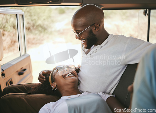 Image of Road trip, black couple and travel during drive through nature on a summer vacation with a smile, happiness and love. Happy man and woman laughing and bonding on safari journey or trip together