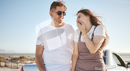 Image of Road trip, couple and love with a man and woman laughing while enjoying travel and tourism together during summer. Happy, smile and romance with a young male and female on a trip or vacation