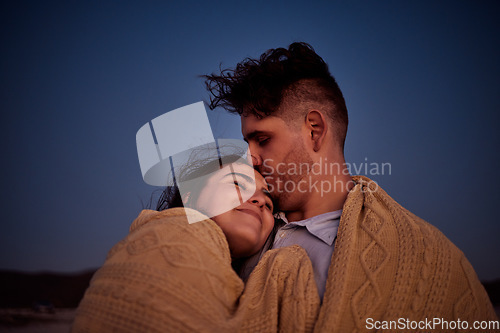Image of Sky, love and couple with blanket at night, enjoying the evening together. Young man and woman in relationship bond in star gazing, camping and cuddling. Travel, peace and people on nature holiday