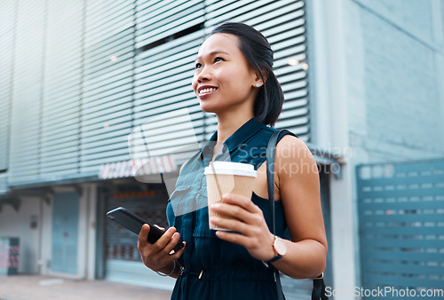 Image of Phone, coffee and travel with an woman out walking in a city of china during the day. Tourist, urban and street with a young asian female taking a walk outdoor in a town street for sightseeing