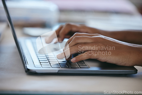 Image of Hands typing, laptop and working freelance woman busy writing email or social media content while sitting at a table. Closeup of online planning, web search and internet browsing female using website