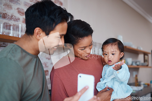 Image of Down syndrome, phone and family for child education, learning and development on video in home. Baby, disability and smartphone with mom, dad and love in house for parents teaching with technology