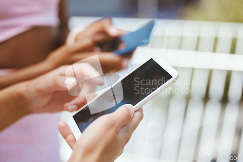 Image of Hands, phone and woman texting, messaging and chatting on social media using internet and browsing online. Female with dark screen reading posts, notification and using mobile app for communication