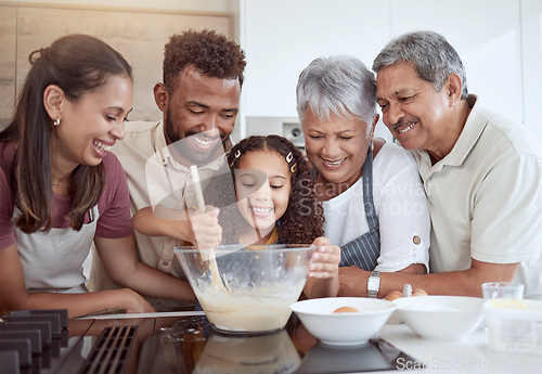 Image of Baking, family and girl in kitchen for cake with ingredients and food in a bowl with grandparents and parents in their house. Mother, father and senior people with smile learning cooking with kid