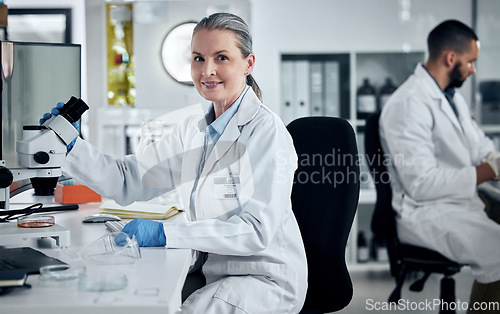 Image of Science, lab and research for innovation, analysis and cure development with woman scientist working in a medical labratory together. Healthcare, biotechnology and discovery in medicine with team