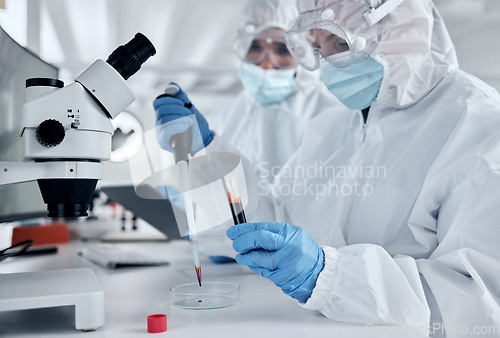 Image of Covid, blood and DNA with a science woman working in a lab for research, innovation and healthcare. Analytics, medical and breakthrough with a female scientist at work in a futuristic laboratory