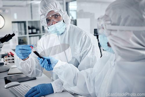 Image of Blood research, medicine or teamwork with doctors or scientist with science, innovation and healthcare analytics in lab. Medical, team or PPE for safety, health or wellness for covid research