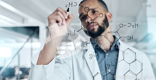 Image of Science, research and formula with a man engineer working and writing on glass in a laboratory. Innovation, analytics and future with a male scientist at work on development in his medical lab