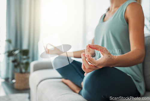 Image of Woman, meditation and mudra hands yoga home workout in lotus pose for exercise, peace and zen fitness. Calm mindset, wellness and healthy female on lounge sofa for balance, praying and relax energy