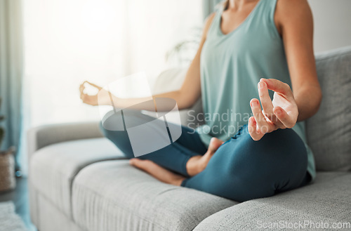 Image of Meditation, yoga peace and hands of woman working on spiritual wellness on living room sofa in her house. Calm person with lotus zen pose for faith, mind health in the morning on the couch