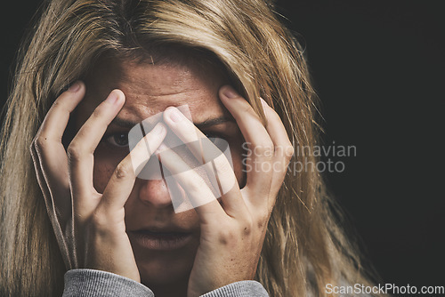 Image of Woman, hands cover or face stress on black background in mental health asylum community or schizophrenia psychology hospital. Anxiety zoom, burnout or depression for fear or counseling scared patient