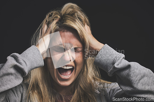 Image of Screaming woman, mental health and depression headache from bipolar anxiety, stress and fear on black background. Angry, psychology and crazy person shout, scary drugs problem and depressed identity