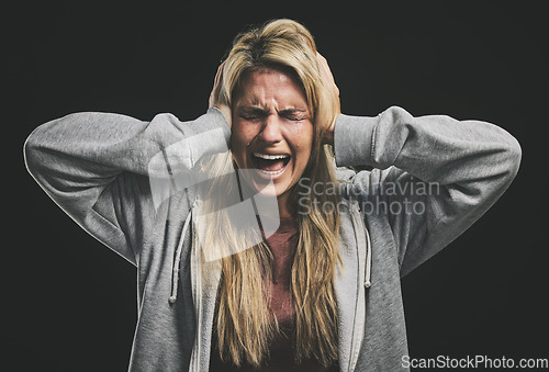 Image of Anxiety, bipolar woman crying, frustrated or crazy on a dark studio for psychology and mental health mock up. Trauma, schizophrenia or depressed girl shout with depression, fear and mental illness