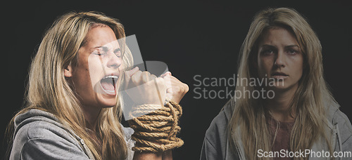 Image of Horror, scared and woman hands in rope crying with double exposure for bipolar, psychology mindset and depression. Violence, mental health and fear of bipolar girl sad, anxiety and shout for help