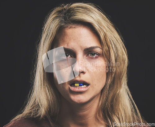 Image of Depression, sad and pills with woman crying from suffering with mental health, stress and anxiety. Frustrated, pain and portrait of girl with medicine in mouth feeling depressed, fear and fail