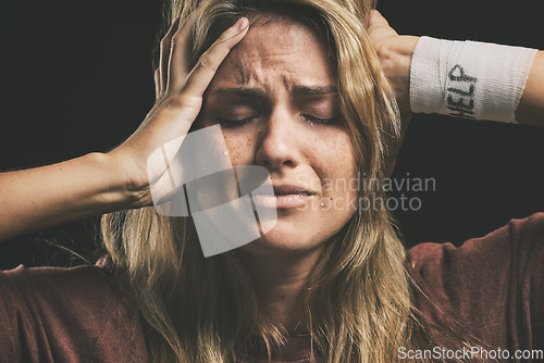 Image of Mental health, depressed woman and help for drug addiction, suicide thoughts or schizophrenia and crying in dark studio. Bandage, paranoid and rehabilitation for crazy female addict with depression