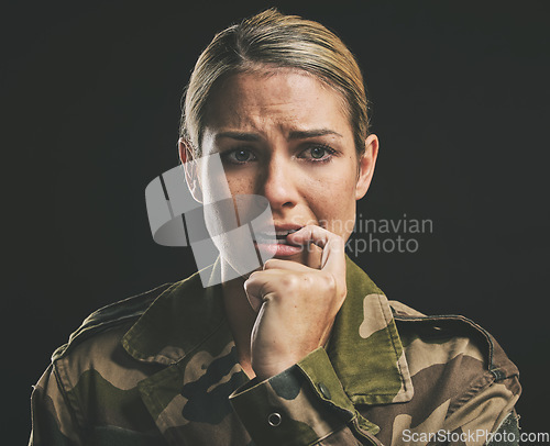 Image of Military, army and woman with ptsd, stress and face show anxiety, mental health or fear with black background. War, female or soldier frustrated bite nail and depression, sad and in uniform depressed