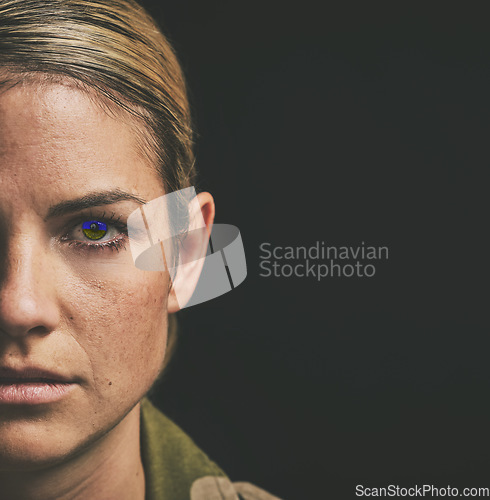 Image of Face, retina scan and mockup with a woman in studio on a dark background for security or data protection. Future, digital and ai with a female robot eye scanning for identity or technology innovation