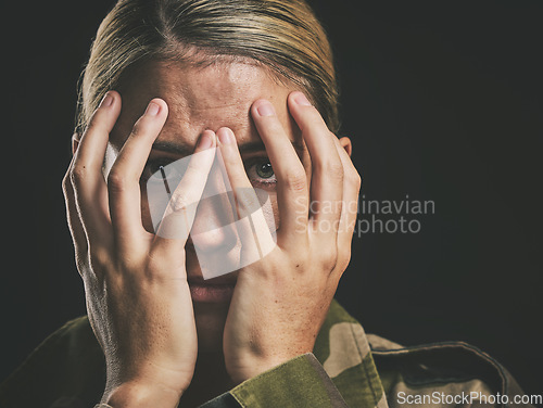 Image of Anxiety, depression and soldier woman crying on dark studio background. Mental health, psychology and stress portrait of sad female cover face, fear or ptsd for military Ukraine war or battle trauma.