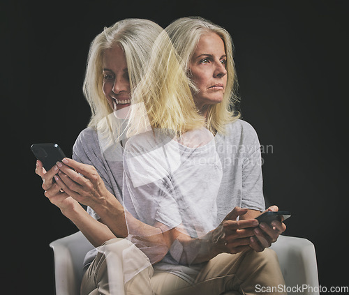 Image of Phone communication, bipolar and senior woman typing on mobile app with mental health problem against a black mockup studio background. Elderly person with schizophrenia, depression or anxiety on web