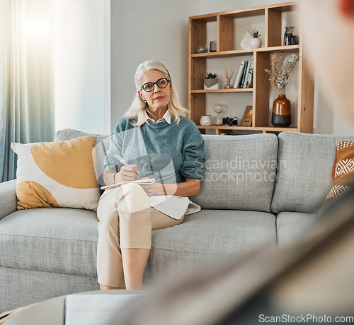 Image of Therapy, mental health planning and psychologist talking to patient in an office at work together. Mature therapist consulting about psychology, problem and solution to stress with person for support