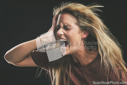 Image of Anxiety, frustrated and trauma woman crying in dark studio for psychology and mental health mock up. Depressed, bipolar or angry girl shout for depression, mental health problem on a black background