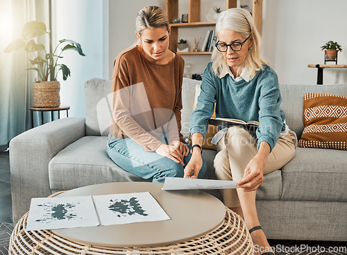 Image of Inkblot test, therapy and woman with psychologist for mental health assessment, mind wellness and documents analysis or results. Psychology check, therapist consulting with patient giving mind advice