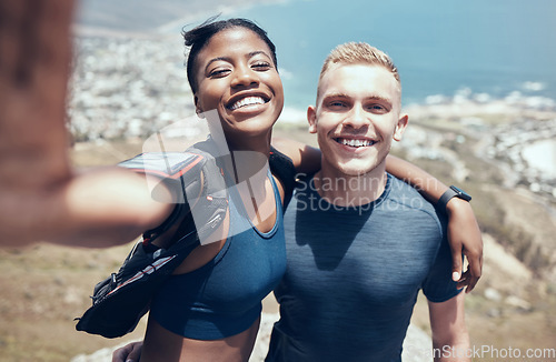 Image of Happy, selfie and couple hiking in nature while on outdoor adventure trip on holiday in South Africa. Smile, trekking and portrait of interracial man and woman on health, wellness and active vacation