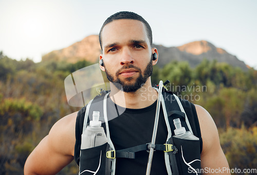 Image of Man, fitness and hiking in mountains, nature environment and Colorado countryside landscape in summer. Portrait, hiker and athlete in fitness workout, wellness training and health exercise motivation