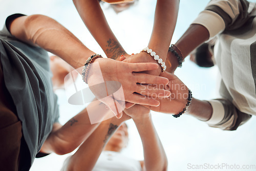 Image of Support, community and teamwork with hands of friends from bottom for goals, vision or networking together. Motivation, collaboration and growth with circle of people for mindset, mission or contact