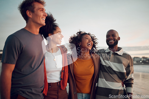 Image of Beach, comedy friends happy with the sunset by the ocean on holiday together in Bali during summer. Group of people with funny communication during sunrise on travel vacation at the sea to relax