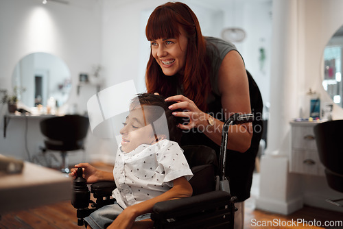 Image of Woman, salon and smile with disability child in wheelchair for haircut. Happy, boy and girl hairdresser for cleaning, cut and styling cerebral palsy kid hair at professional barber store in New York
