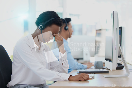 Image of Headache, stress and burnout call centre woman consultant, telemarketing agent and customer support staff in office. Frustrated, sick and problem consulting worker in pain, mistake and desktop glitch